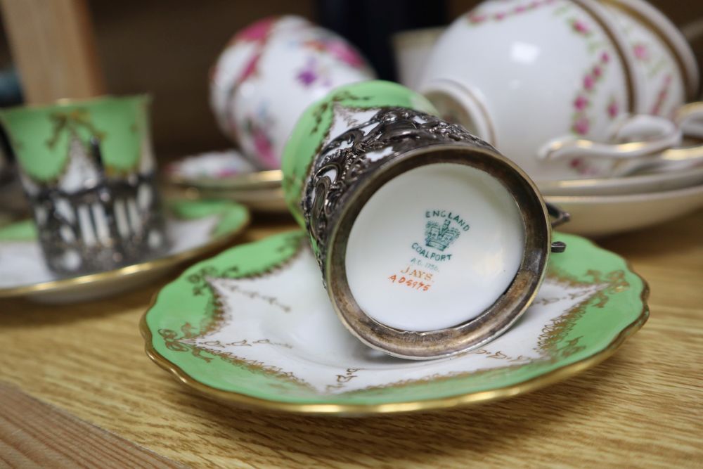 A pair of Coalport silver mounted coffee cans and saucers, together with other mixed ceramics and glass